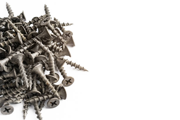 istock Screws still life large self tapping screws on white background 1076807778