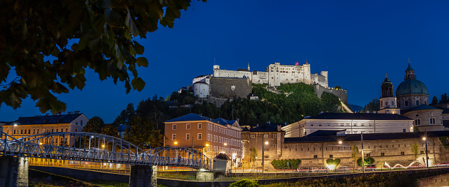 Picture of Salzburg and Salzach River at Night, the Centre of the City of Salzburg is a UNESCO World Heritage Site. Hohensalzburg Castle is one of the most preserved baroque castles