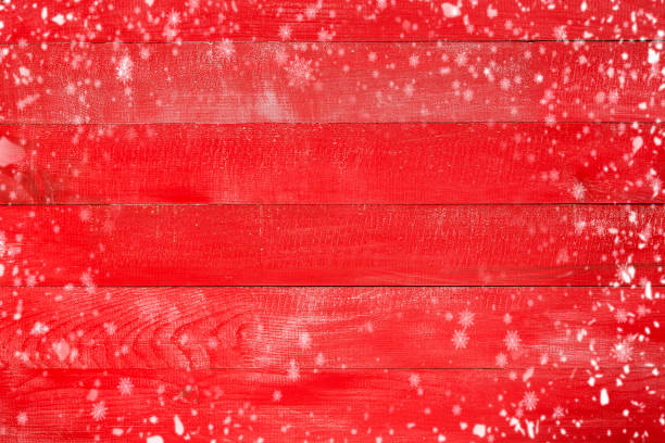 Wooden red Christmas background with snowflake