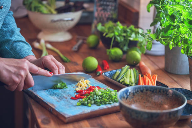 istock Preparing Spring Rolls with Vegetables and Shrimps 1076810688