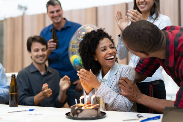 istock Business colleagues celebrating birthday party at work 1076812396