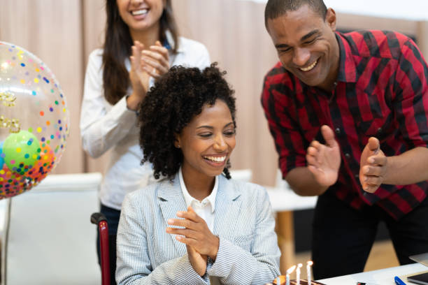 istock Business colleagues celebrating birthday party at work 1076814790