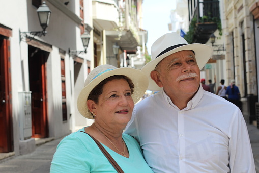 Lovely senior Hispanic couple outdoors close up.