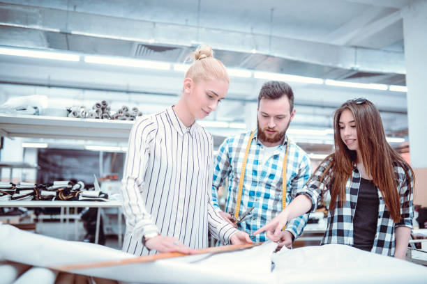 istock Fashion Team Cutting Material 1076817772