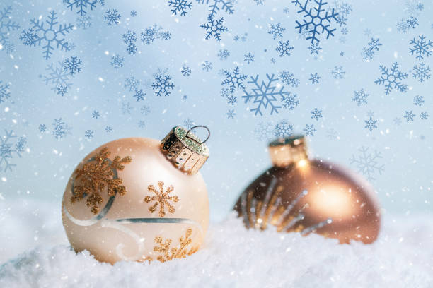 istock Gold Christmas balls with snow flakes background 1076818216