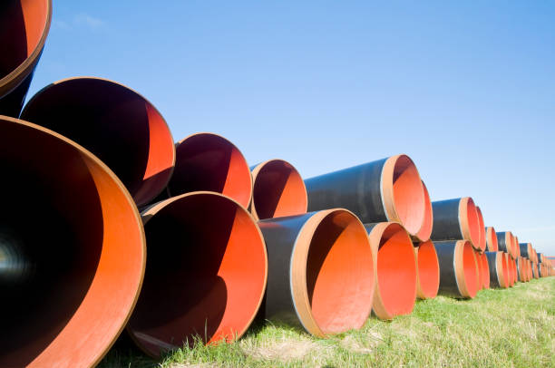istock Pipeline construction - Stacked pipes for a natural gas pipeline 1076820410