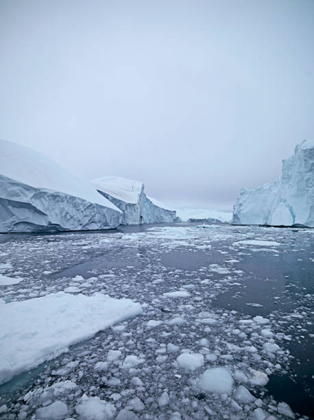 istock Icebergs on Arctic Ocean in Greenland 1076824428