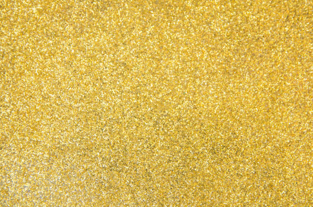 istock Defocused gold glitter background. Gold abstract bokeh background. Christmas abstract background 1076825020