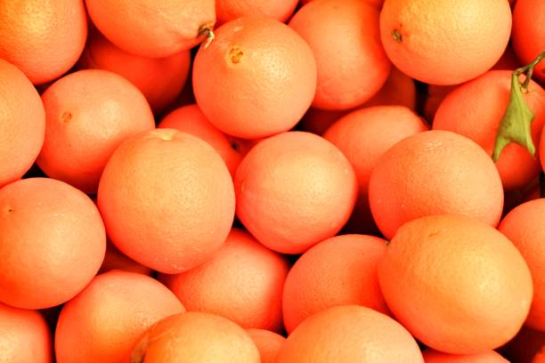 istock Oranges for sale at a market stall 1076848870