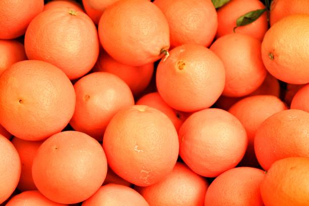 istock Oranges for sale at a market stall 1076848896