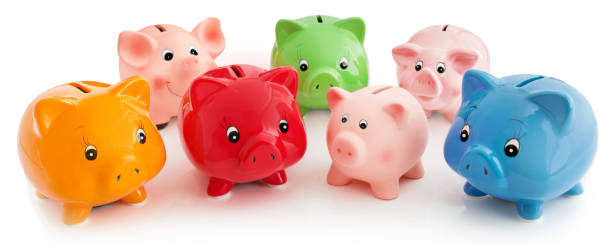istock Piggy bank against white background 1076857078