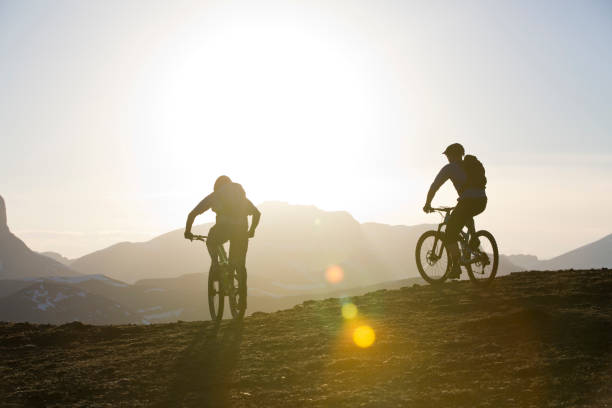 istock Mountain Bike Sunset Adventure 1076863436