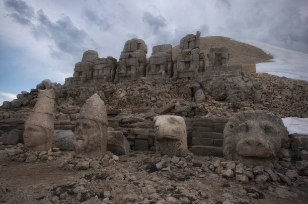 istock Ruins of sculptures at mountain Nemrut 1076865794