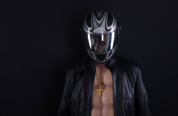 istock biker with a naked torso 1076870986