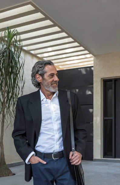 istock Businessman confident, leaving home for work 1076885392