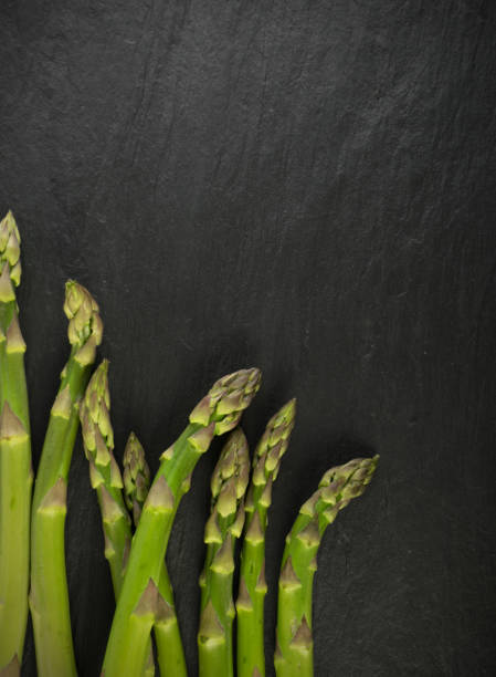 istock Bunch of Raw Garden Asparagus 1076893732