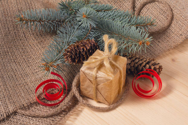istock Gift in retro styles a wooden surface. New Year's scenery 1076894980