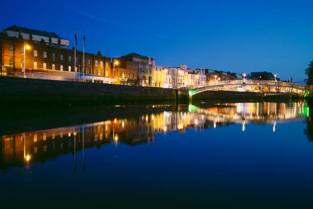 istock Ha'penny Bridge and Liffey river in Dublin by night 1076898636