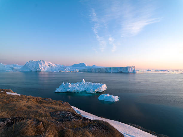 istock Arctic Icebergs on Arctic Ocean 1076904296