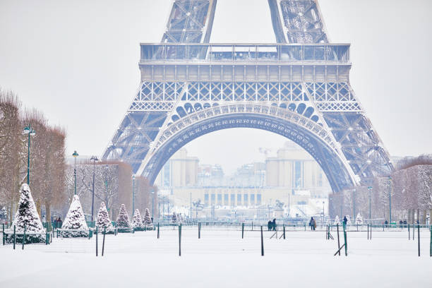 istock Scenic view to the Eiffel tower on a day with heavy snow 1076910898