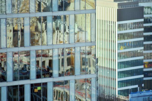 istock Modern office building facade abstract fragment, shiny windows in steel structure. 1076926862