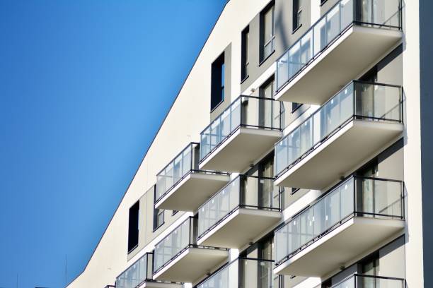 istock Modern apartment buildings on a sunny day with a blue sky. 1076928416
