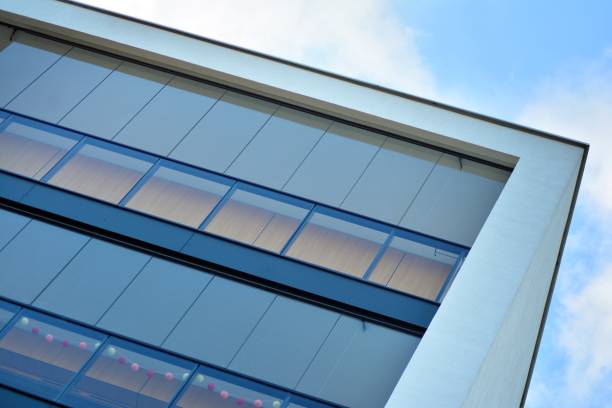 istock Modern apartment buildings on a sunny day with a blue sky. 1076929972