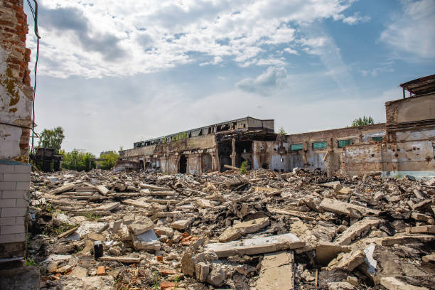 istock Earthquake or war aftermath or hurricane or other natural disaster, broken ruined abandoned buildings, pills of concrete garbage 1076930526