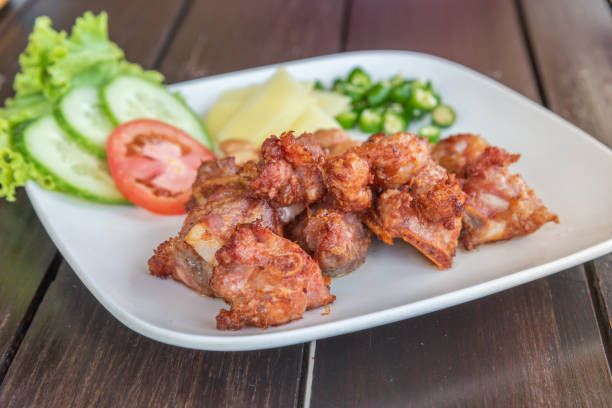 Fried Fermented Pork Ribs with ginger and chili, Northern Thai food