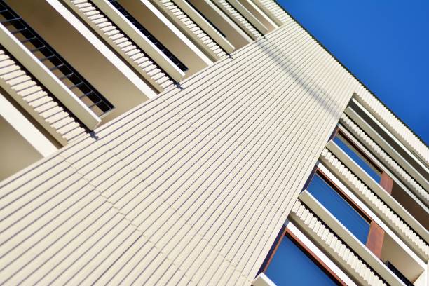 istock Modern apartment buildings on a sunny day with a blue sky. 1076933236