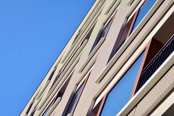 istock Modern apartment buildings on a sunny day with a blue sky. 1076934524