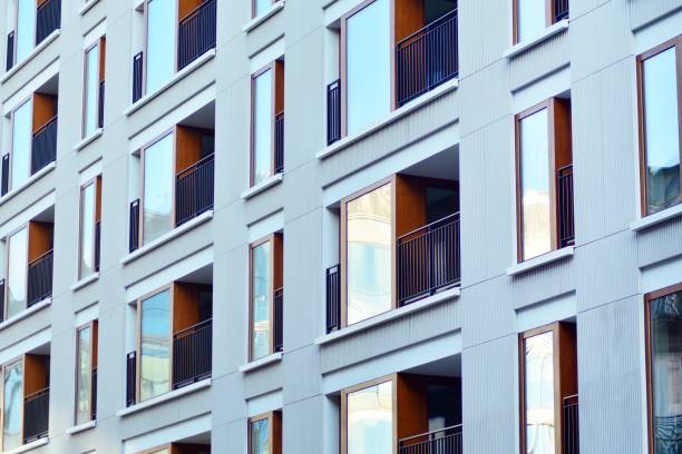 istock Modern apartment buildings on a sunny day with a blue sky. 1076934598