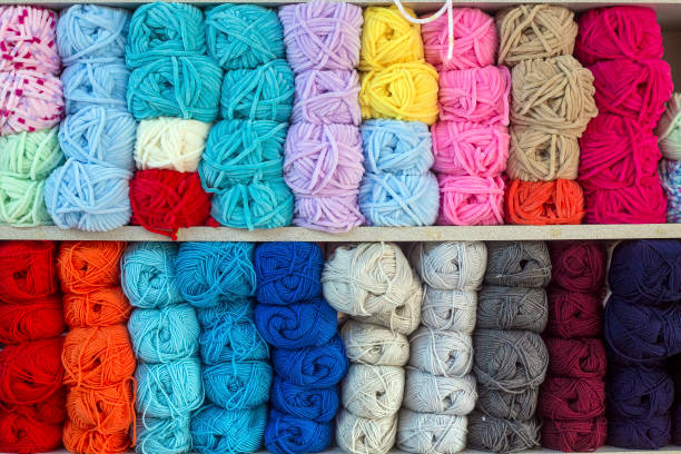 istock Close up shot of colored wool yarn balls as background 1076935568