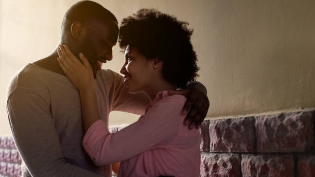 istock Romantic couple hugging on city bystreets, first romantic date, tender relations 1076954314