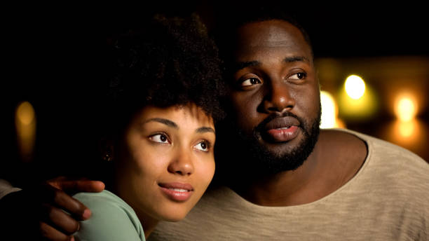 istock Beautiful afro-american couple looking together at bright future, perspective 1076954854