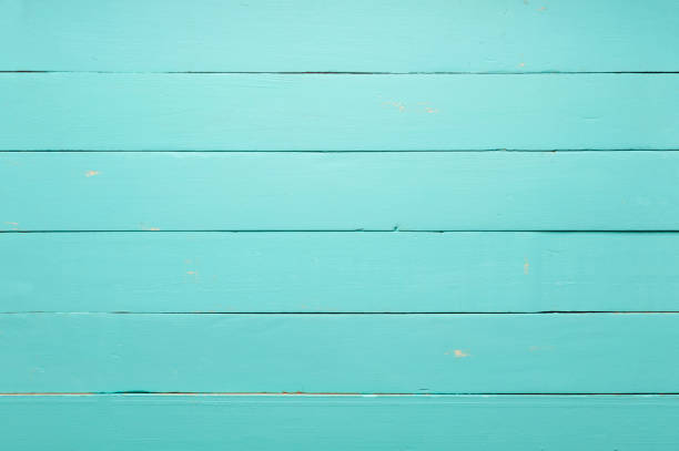 istock Empty old teal green wooden table 1076982286