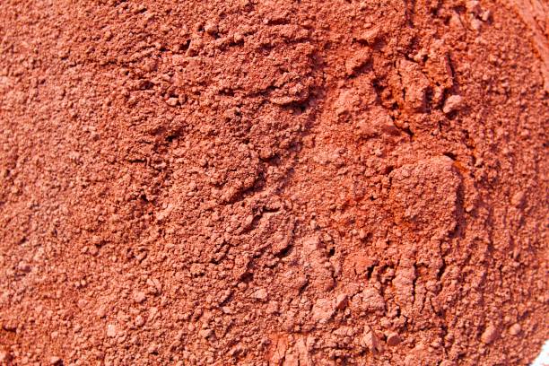 istock Abstract high resolution image of red oxide powder 1077023826