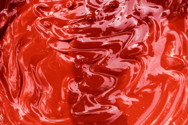 istock Dark Red abstract background with wave pattern.This is a mixture of wet cement concrete and red oxide Cement Color Powder. Abstract, background and textures 1077026784