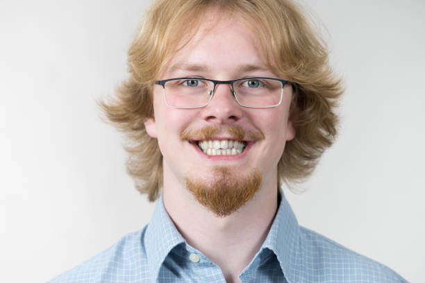 istock Funny looking young adult guy 1077031416