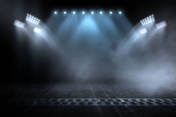 istock Race track finish line racing on night 1077034836