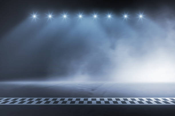 istock Race track finish line racing on night 1077034852