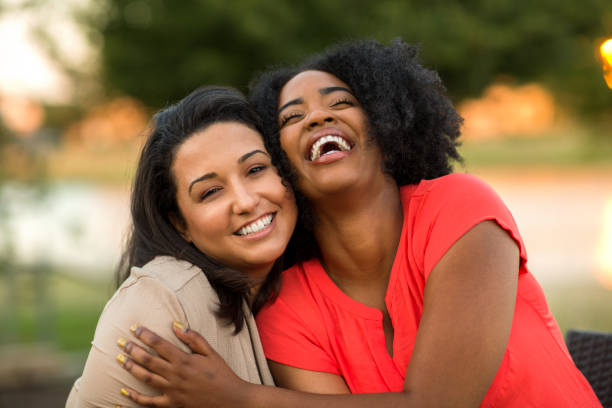 istock Multi-ethnic group of friends laughing. 1077040550