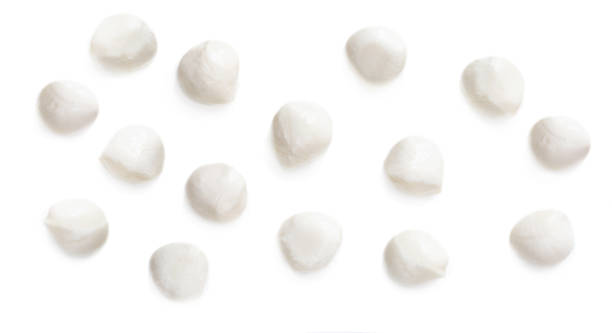 istock Fresh Mozzarella isolated on white background.  Traditional Italian Mozzarella cheese balls close up.  Top view 1077047596
