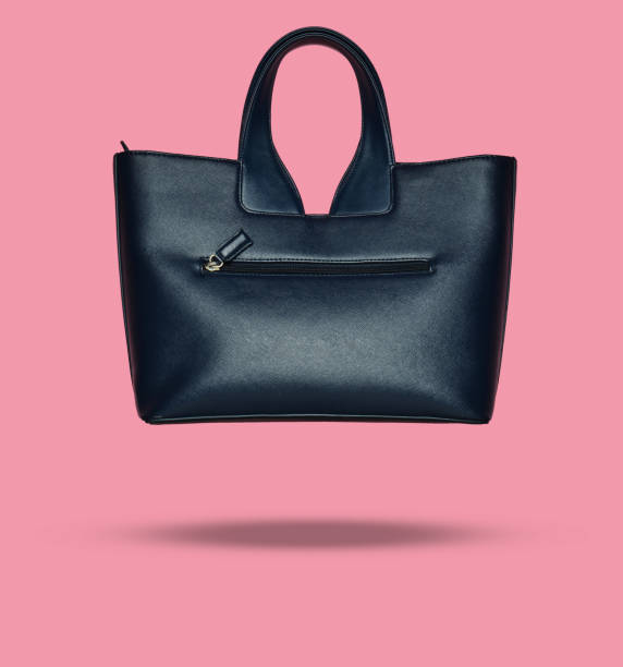 istock Leather bag on a pink background. 3D photo 1077048808