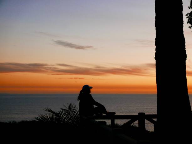 santa monica sunset - contemplation sunset eternity thinking stock-fotos und bilder