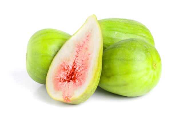 istock Ripe green fig fruit and half isolated on white background 1077059264
