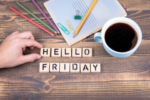 istock Hello Friday. Wooden letters on the office desk 1077061904