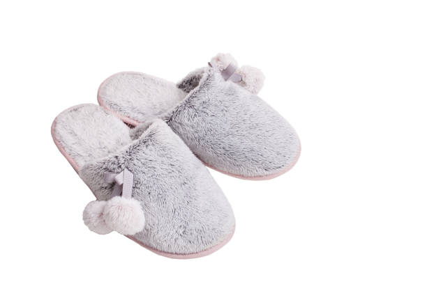 istock gray fur slippers isolated on white 1077063278