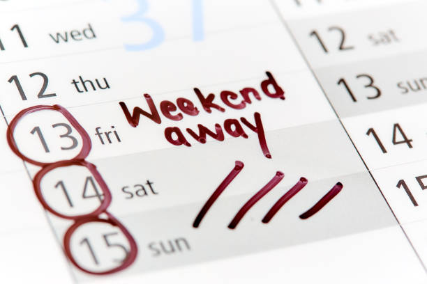 A calendar has a  3-day weekend marked out and circled and labeled Weekend away