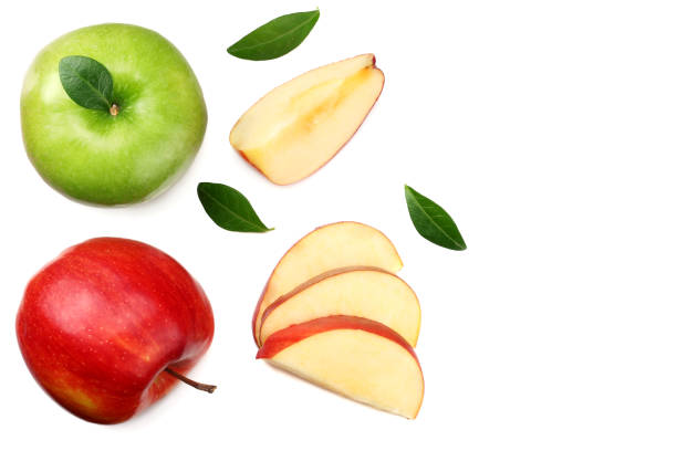 istock green and red apples with slices isolated on white background. top view 1077067834